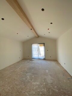 vaulted-ceiling-exposed-beam-renovation-progress